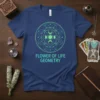 Blue t-shirt with a green gradient Flower of Life Geometry design, including moon phases and stars