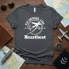 Fly Explore Live Heartbeat t-shirt with airplane and heartbeat graphic, dark grey tee