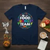 Navy t-shirt with "Food Services Team" in colorful letters surrounded by descriptive words and food graphics