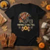 Football helmet design with football, pumpkins, leaves, and coffee cup, text "Football & Fall Y'all" below, on a black t-shirt