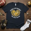T-shirt design with white text "FOOTBALL IS MY HEARTBEAT TRUE LOVE OF THE GAME" surrounding a graphic of a football