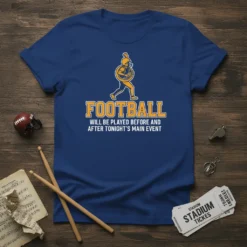 T-shirt with the text "FOOTBALL WILL BE PLAYED BEFORE AND AFTER TONIGHT'S MAIN EVENT" and a marching band tuba player