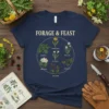 Forage & Feast Edible Plants T-Shirt featuring botanical illustrations of dandelion, stinging nettle, wild garlic, elderflower, blackberry, and bonnthera