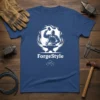 ForgeStyle Blacksmith T-Shirt featuring a muscular blacksmith hammering metal on an anvil, surrounded by flames, with "ForgeStyle" text
