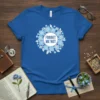 Forget Me Not text inside a blue floral wreath design on a royal blue t-shirt