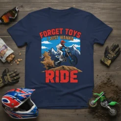Forget Toys I Just Wanna Ride text with a dirt bike rider graphic, mountains, and mud in a vibrant illustration