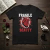 Fragile Beauty t-shirt design with a red anatomical heart graphic and white text