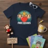 Free Kisses t-shirt design with a monkey, giraffe, and cow peeking over a red heart, vintage circle graphic