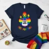 Navy t-shirt with a rainbow heart and cactus wearing a white apron that says "FREE HUGS", text "FREE MOM HUGS"