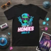 Free My Homies Area 51 text with a cartoon alien holding a boombox and peace signs on a black t-shirt