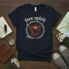 Navy t-shirt with "free spirit" text above a circular graphic of a bird in flight with sun rays