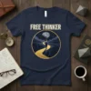 Free Thinker t-shirt design with a person walking a golden path towards a brain under a starry sky