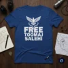 Blue t-shirt with white text 'FREE TOOMAJ SALEHI' and a dove symbol with broken chains