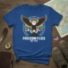 Freedom Flies Est. 1776 t-shirt design featuring a bald eagle perched on a mountain peak with a circular patriotic graphic