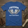 FREEDOM SOAR TO NEW HEIGHTS text with stylized wings graphic on a blue t-shirt