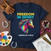 Freedom In Spirit Unbridled & Wild text with a colorful abstract horse graphic on a navy t-shirt
