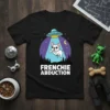 Frenchie Abduction T-Shirt design featuring a French Bulldog being beamed up by a UFO under a starry night sky