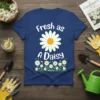 Navy blue t-shirt with "Fresh as A Daisy" text and a large white daisy graphic, surrounded by smaller daisies