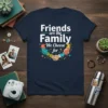 Friends are the Family We Choose for quote with puzzle pieces and shaking hands graphic on a navy t-shirt