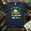 Frog graphic with text "Frogs Are Awesome I'm Awesome inhale I'm A Frog" on a navy blue t-shirt