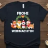 Frohe Weihnachten German Christmas t-shirt with a festive wreath and cute fox, penguin, and dog wearing Santa hats
