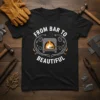 From Bar To Beautiful blacksmith quote on a black t-shirt, featuring a fiery forge graphic