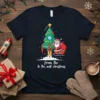 From the to the wall christmas t-shirt with Santa Claus riding a rocket past a Christmas tree