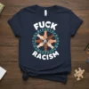 Navy blue t-shirt with "FUCK RACISM" text, diverse hands forming a circle, and symbols of unity
