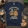 Funny cat wearing sunglasses with a coffee cup, text "Fueled by Caffeine and Serious Cattitude"