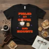 Fueled By Coffee And Biscuits text design with a coffee cup, coffee beans, and stack of biscuits graphic