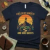 Fueled by Sunsets and Side Quests t-shirt design featuring a hiker on a mountain peak at sunset, with trees and