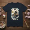 FUKU cat with mask graphic tee featuring Japanese characters, coins, and cherry blossoms