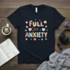 Full of Anxiety text design with cute hearts, stars, and smiley face on a navy t-shirt