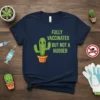 Navy t-shirt with green text "FULLY VACCINATED BUT NOT A HUGGER" and a cute potted cactus graphic
