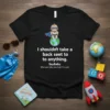 Black t-shirt with "I shouldn't take a back seet to anything. SayBaby." quote and superhero baby graphic