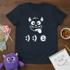 Kids' t-shirt with a white cartoon monster face and :) :) e text