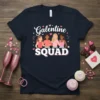 Galentine SQUAD t-shirt featuring four diverse women holding hands with pink hearts and glitter accents, celebrating friendship