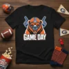 Black t-shirt with "GAME DAY" text and a fierce bear wearing a football helmet and holding up fingers, representing the