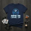 Game On Level Up gamer t-shirt design with headphones, controller, and pixel heart graphic