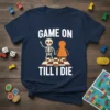 Game On Till I Die t-shirt featuring a skeleton and game piece on a chessboard, with dice and board game