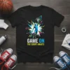 Basketball player dunking with "Game On The Court Awaits" text on a black t-shirt, vibrant abstract background