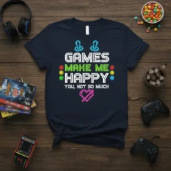 Games Make Me Happy You Not So Much quote in neon-style font on a navy t-shirt, with pixel heart graphic