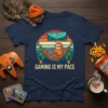 Gaming Is My Pace t-shirt with a sloth relaxing in a hammock playing video games, sunset background