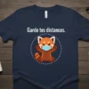 Navy blue t-shirt with "Garde tes distances" text and a red panda wearing a face mask