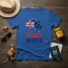 Blue t-shirt with "G'DAY MATE" text and an outline map of Australia featuring the Union Jack flag and Southern Cross