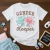 Gender Keeper t-shirt with two cowboy hats, one pink and one blue, and baby boots