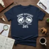 Navy t-shirt with "GENOME DIFFERENCE Woolly Mammoth Indian Elephant .04%" text and elephant graphics