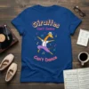 T-shirt with the text "Giraffes Can't Dance Can't Dance" and a cartoon dancing giraffe graphic