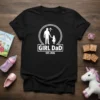 Black t-shirt with "GIRL DaD EST. 2026" text and silhouette of father and daughter