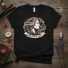 Girls Will Be Girls quote on a black t-shirt with a stylized woman's profile and floral accents